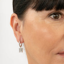 Load image into Gallery viewer, Despina Rhodium Hoop Earrings with Baguette CZ - Mandi at Home